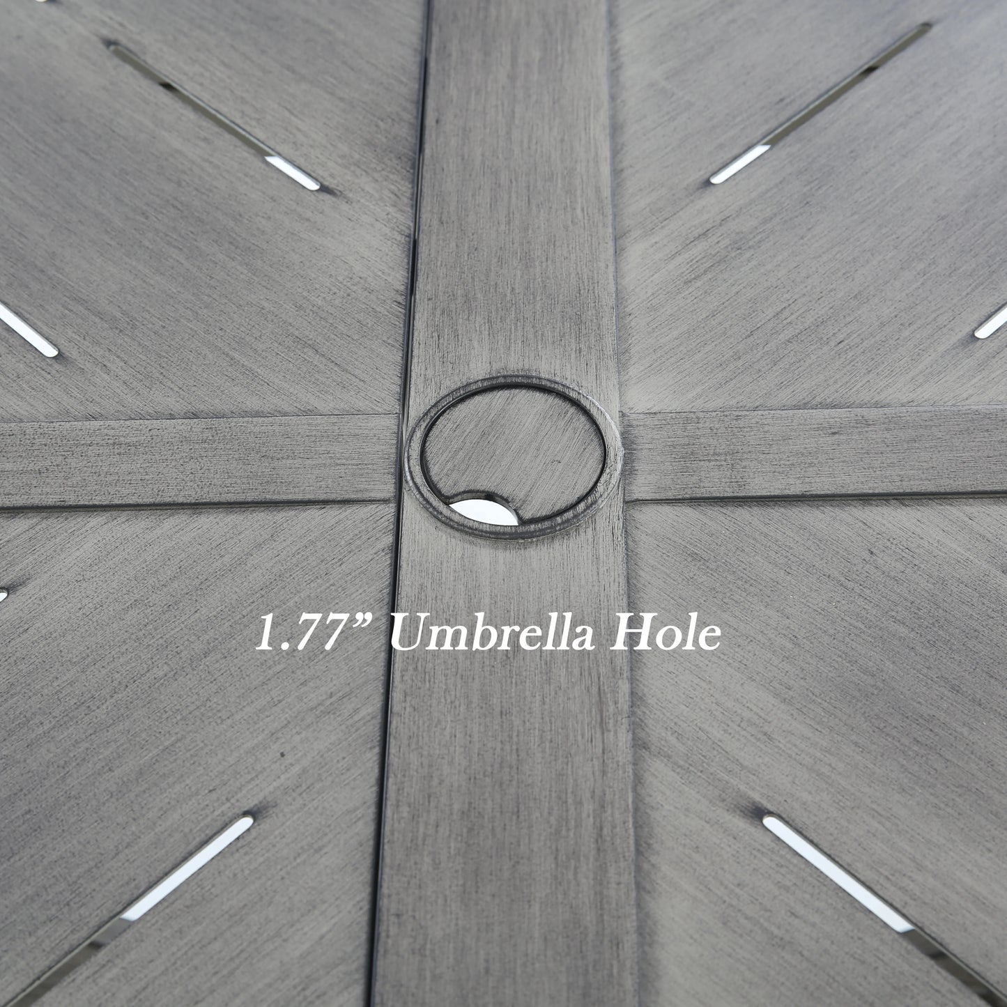 Close-up of a wooden patio table with an umbrella hole labeled '1.77" Umbrella Hole'.