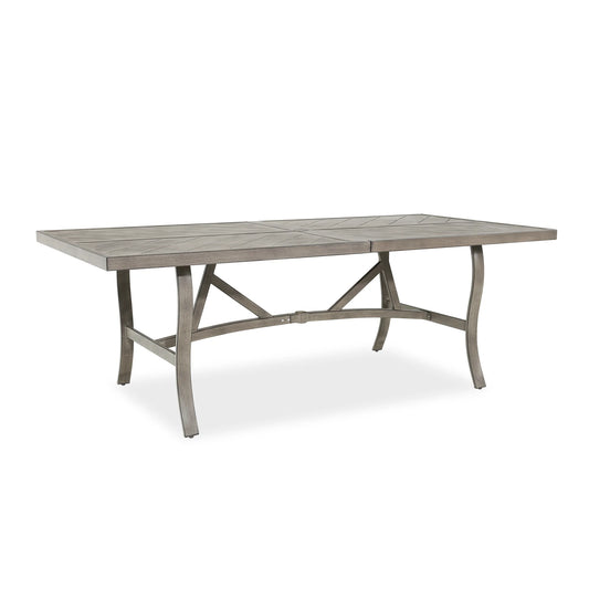 Rectangular outdoor dining table with a rustic finish