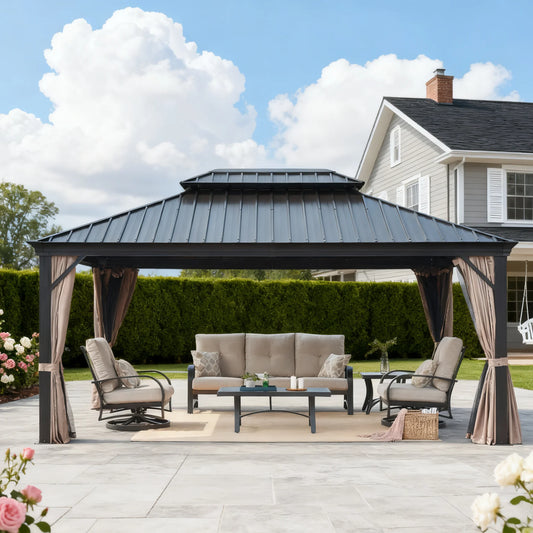 Outdoor gazebo with patio furniture on a patio area in front of a house.