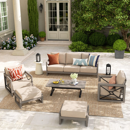 Outdoor patio furniture set with cushions on a patio area.