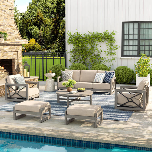 Outdoor patio set with furniture by a poolside