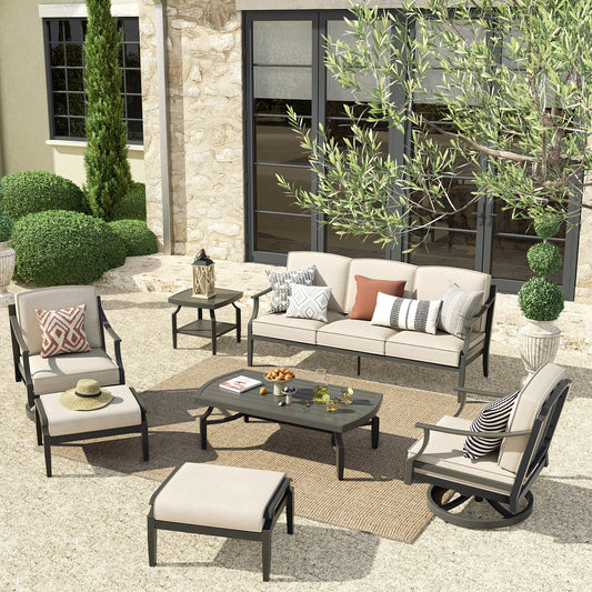 Outdoor patio set with furniture and decor in a garden setting