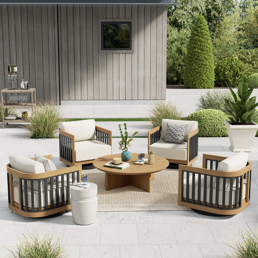 Outdoor patio furniture set with wooden chairs and table on a patio with plants and a wall in the background.
