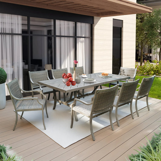 Outdoor patio set with table and chairs on a wooden deck