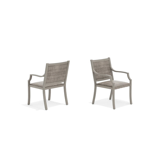 Two gray wicker chairs