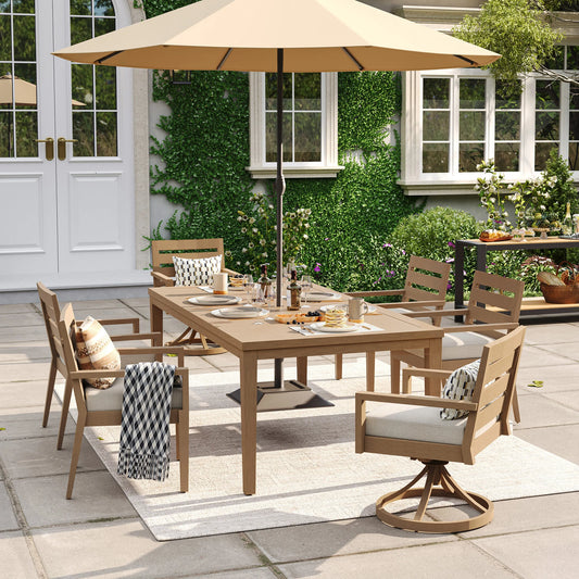Alcudia 7-piece mixed seating patio set showcasing 4 stationary side chairs, 2 swivel rocker end-chairs, and a large beige market umbrella over the table.