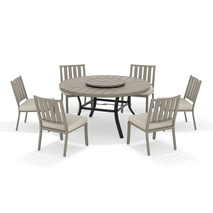 Round outdoor dining table with six armless chairs