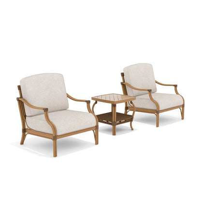 Two beige cushioned chairs with wooden frames and a matching side table on a white background