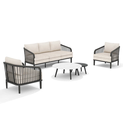 Outdoor furniture set with sofa, chairs, and ottoman on a white background