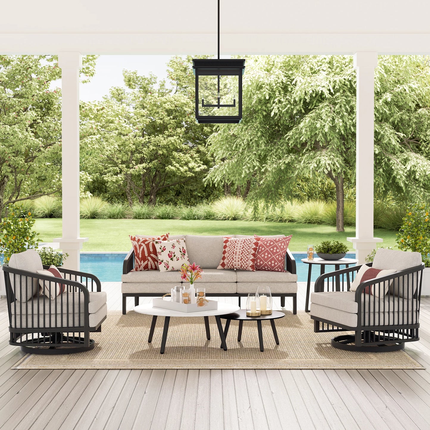Outdoor patio set with furniture and decor on a wooden deck.