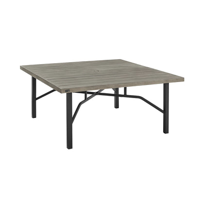 Square outdoor table with gray top and black legs