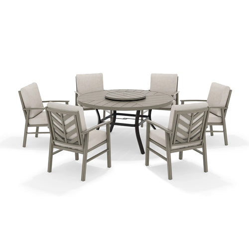 Round outdoor dining table with six dining armchairs