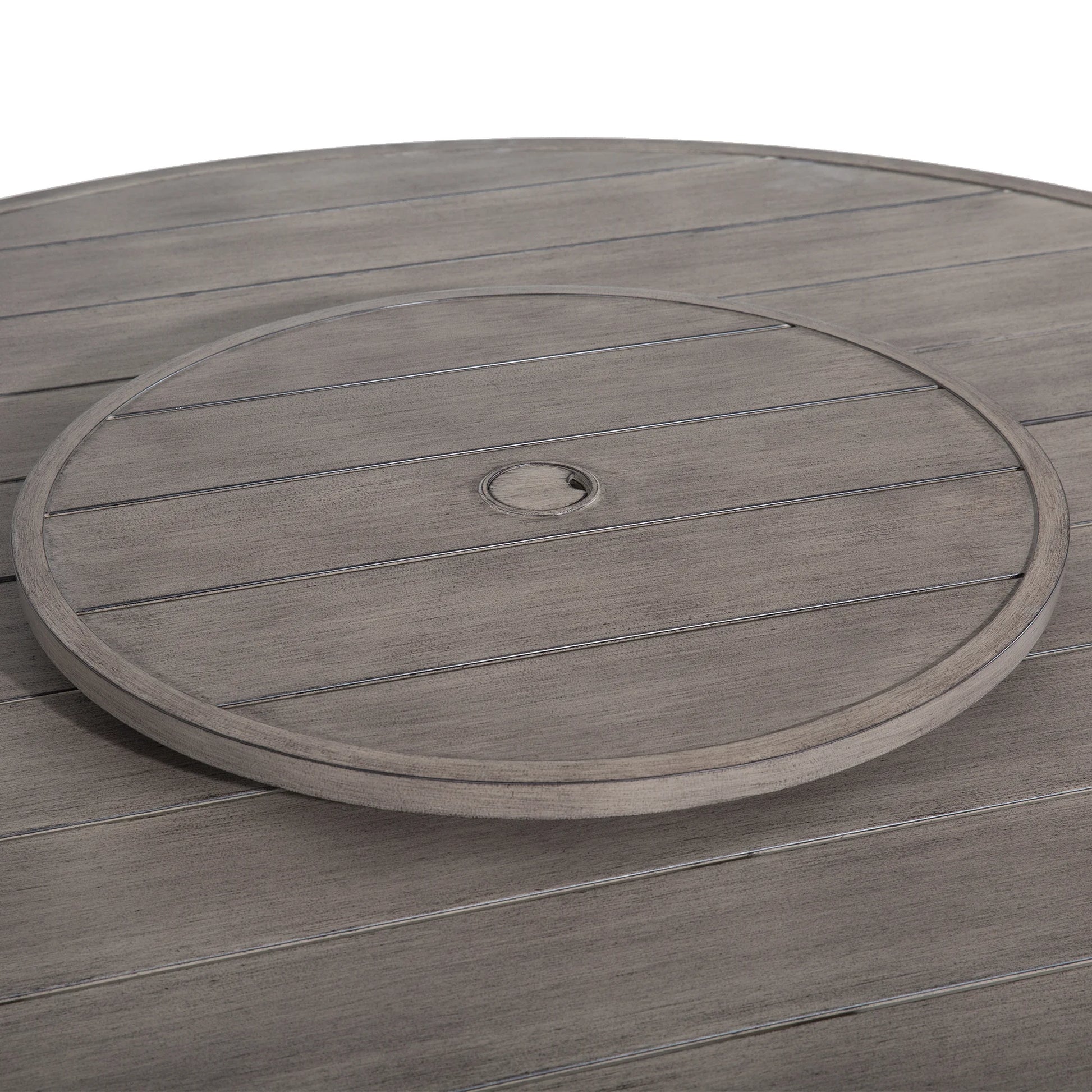 Round wooden deck with a central drain hole on a white background