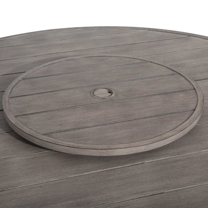 Round wooden deck with a central drain hole on a white background
