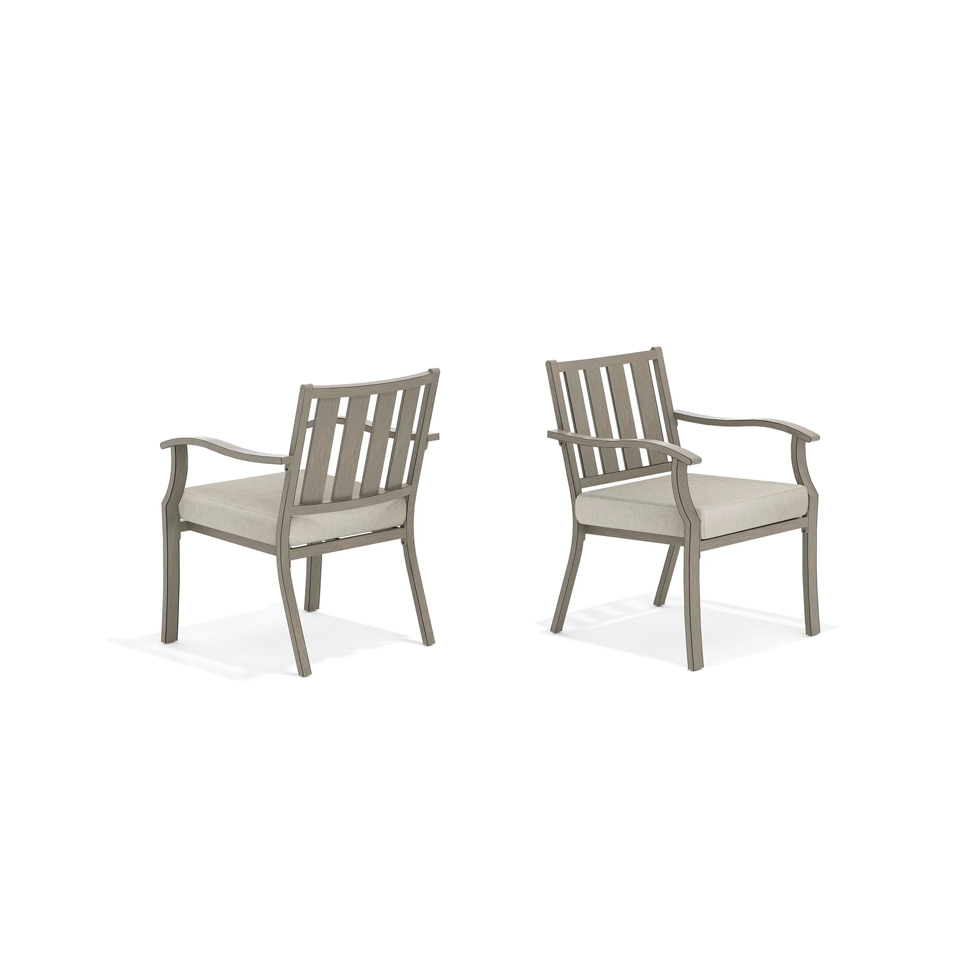 Two gray chairs with beige cushions 