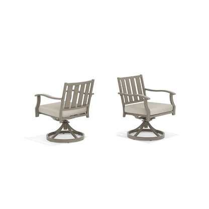 Two gray swivel chairs with beige cushions 
