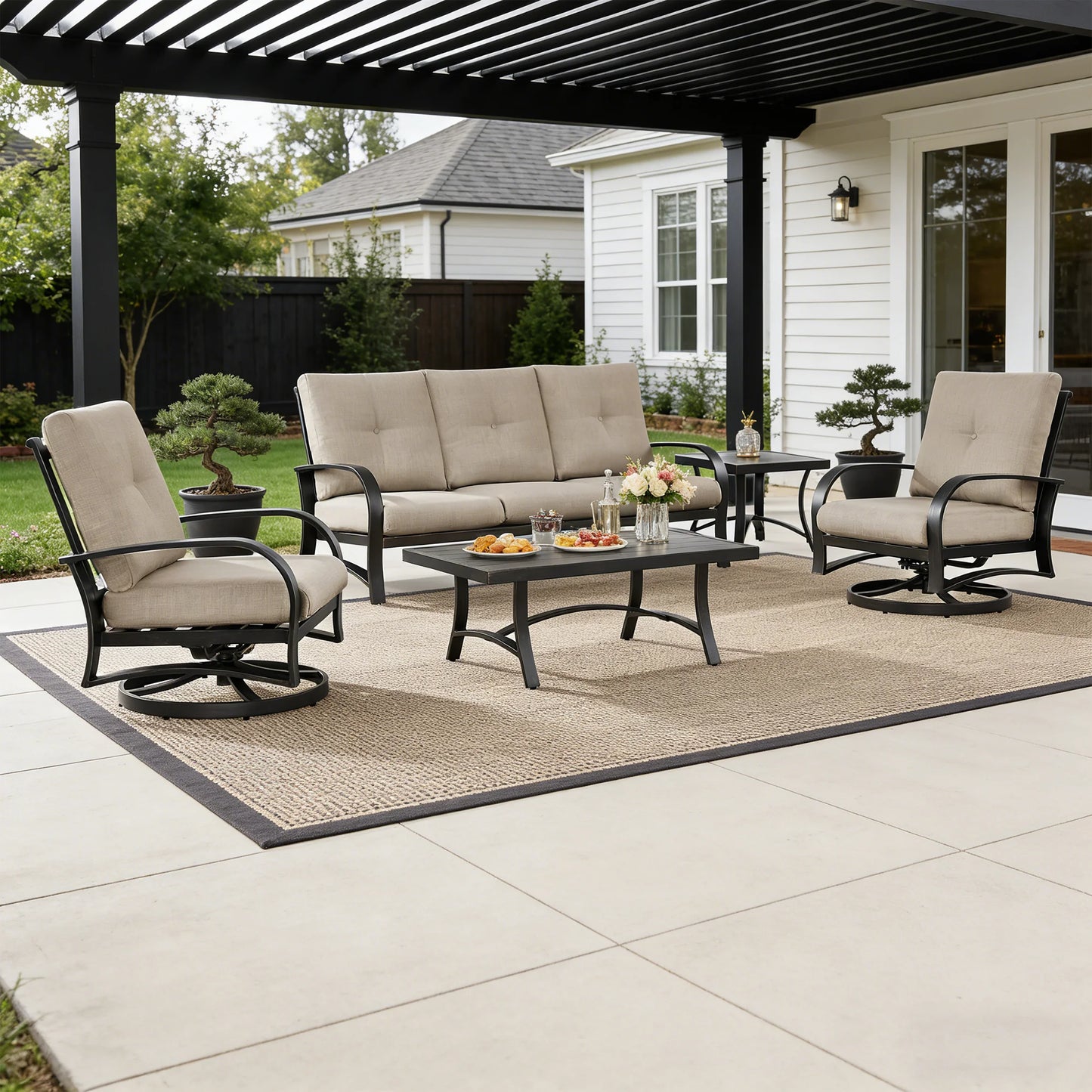 Outdoor patio set with furniture and table on a patio area.
