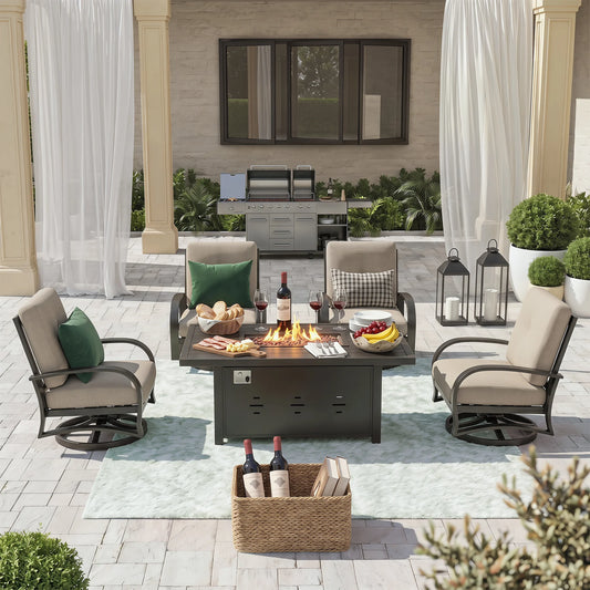 Outdoor patio setup with fire pit table, chairs, and decorative elements on a patio.