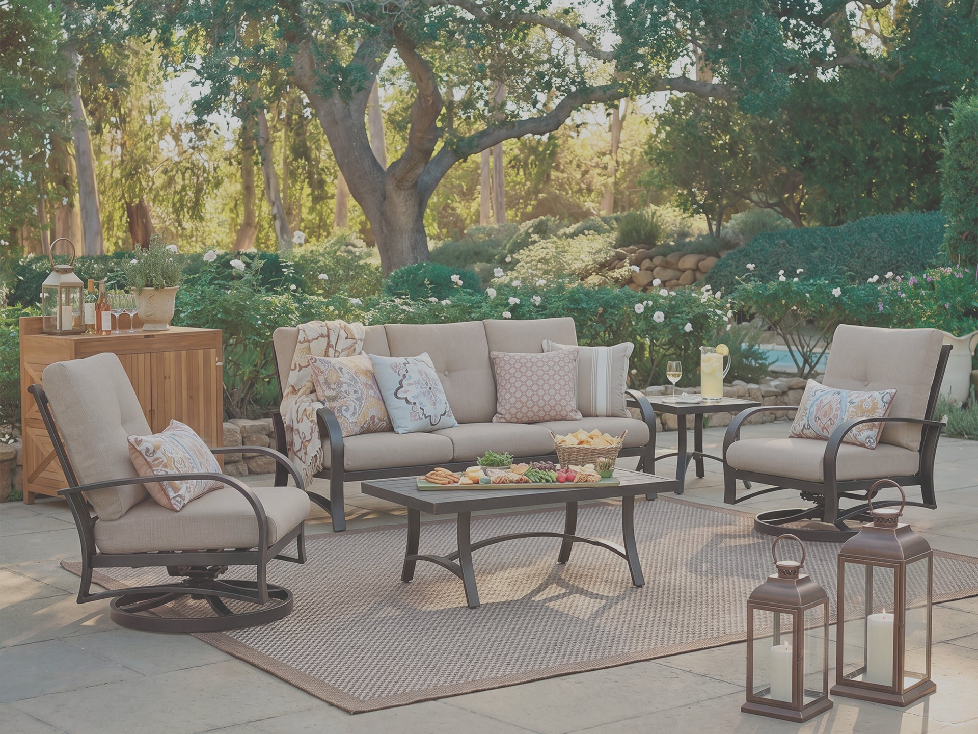 Outdoor patio setting with furniture and decor in a garden