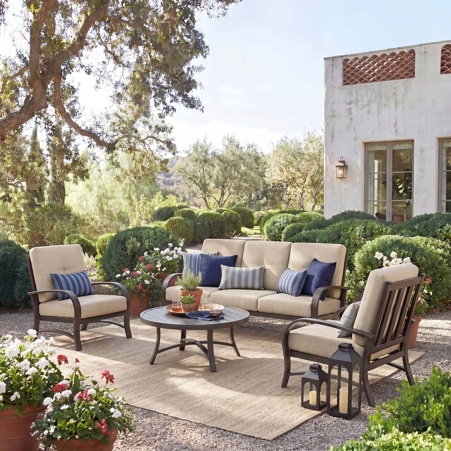 Outdoor patio set with furniture and decor in a garden setting