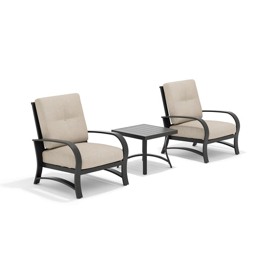 Two patio chairs with beige cushions and a side table