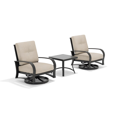 Two patio swivel chairs with beige cushions and a end table