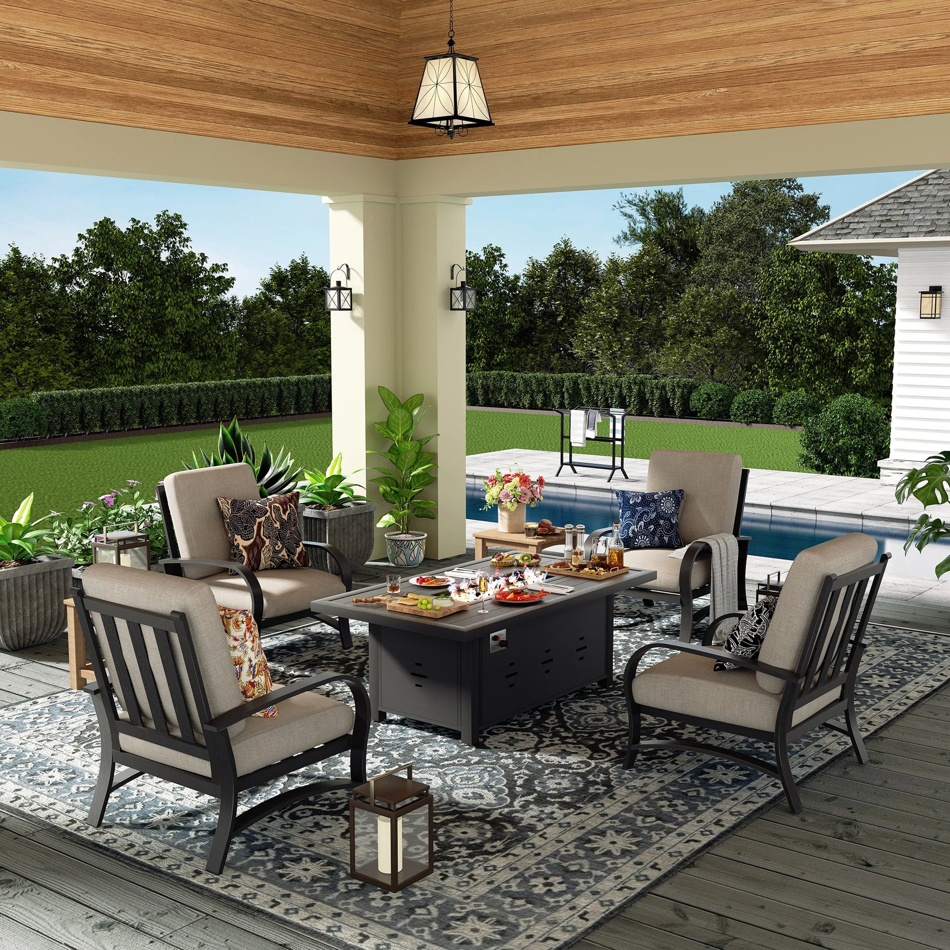 Outdoor patio setting with furniture, table, and decor on a wooden deck.