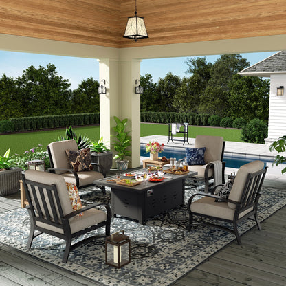Outdoor patio setting with furniture, table, and decor on a wooden deck.