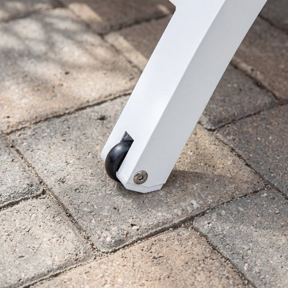 White scooter wheel on a paved surface