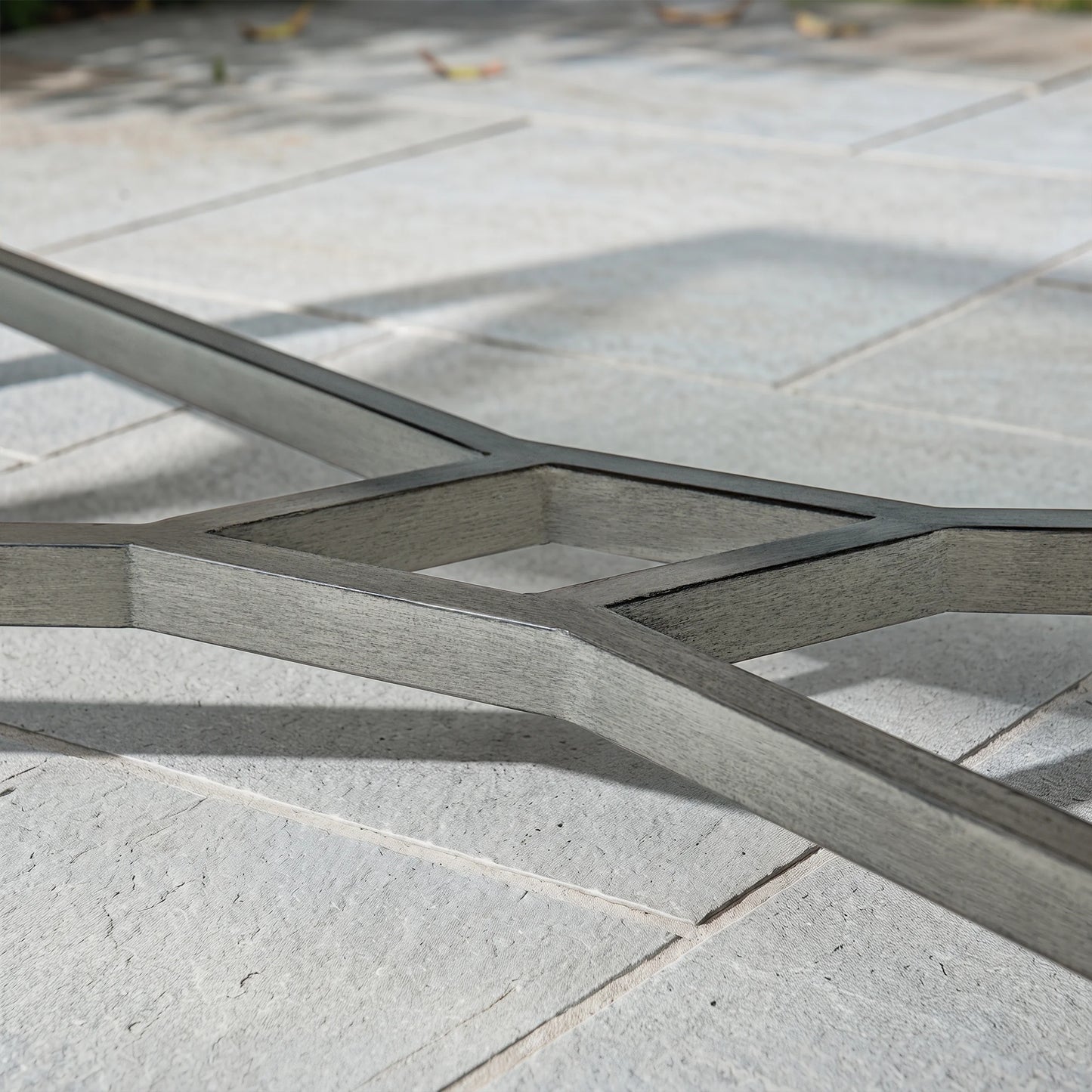 Close-up of interlocking stone pavers on a patio