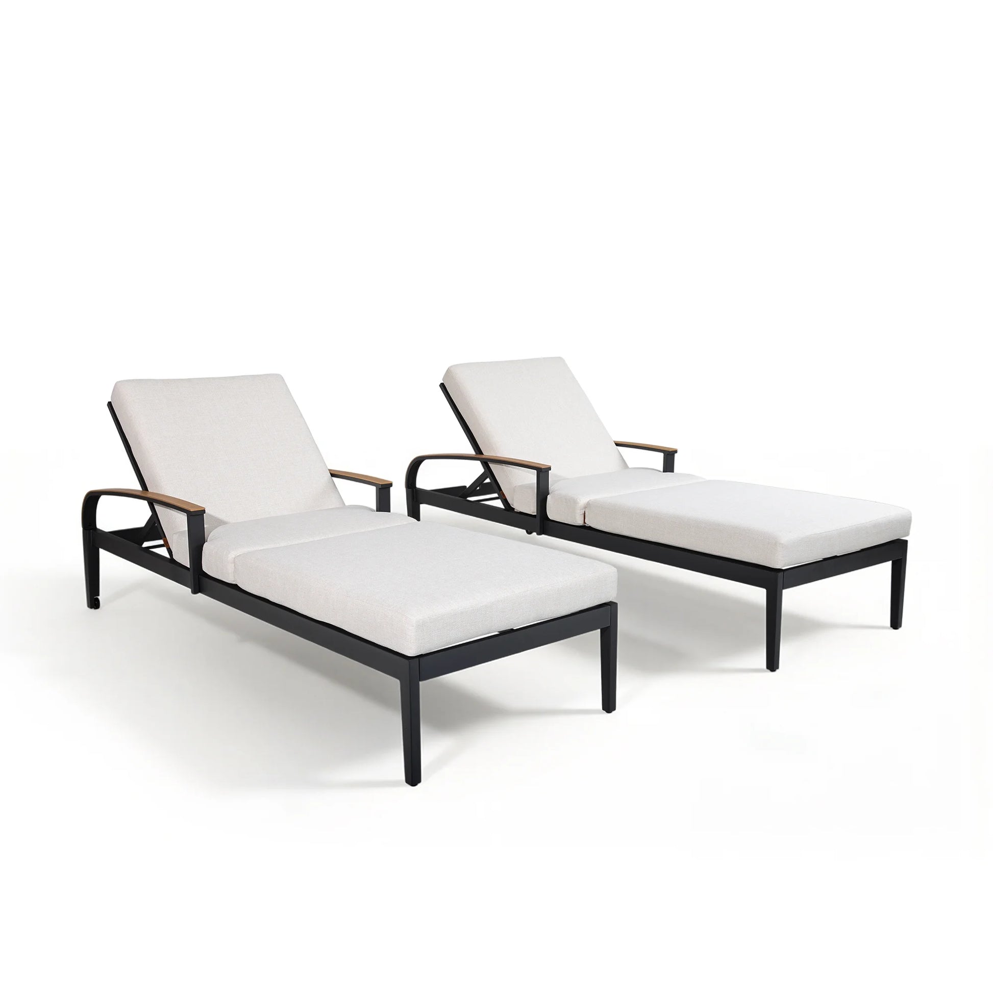 Two lounge chairs with white cushions on a white background