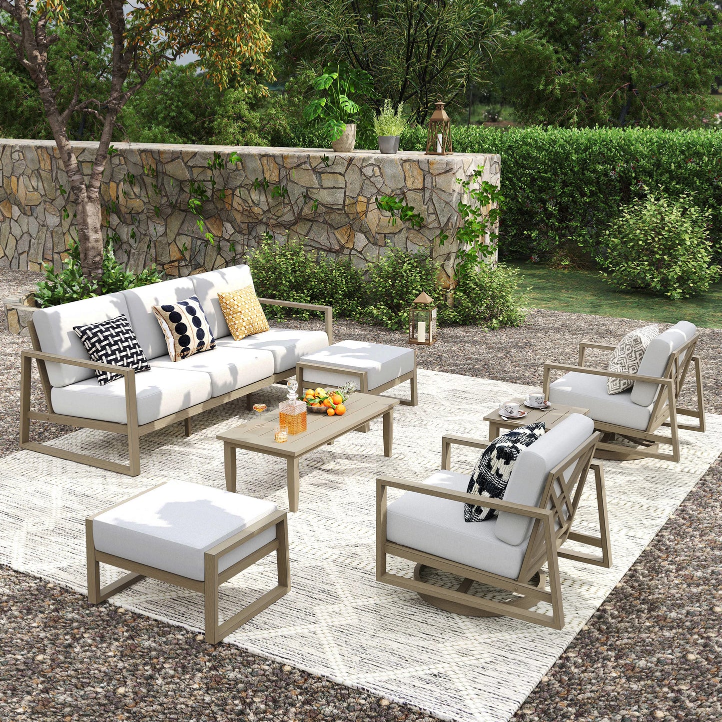 Outdoor patio set with furniture and decor in a garden setting