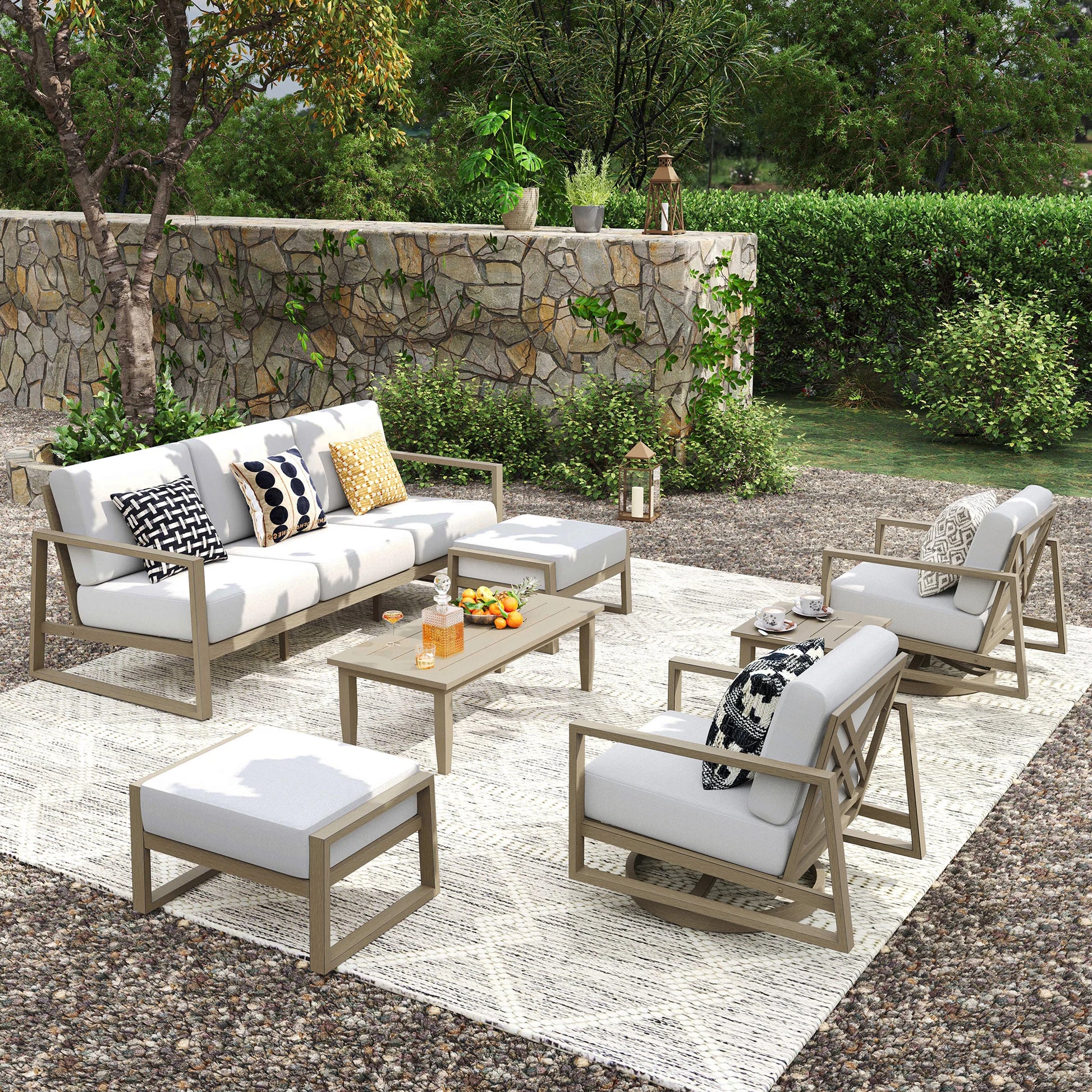 Outdoor patio set with furniture and decor in a garden setting