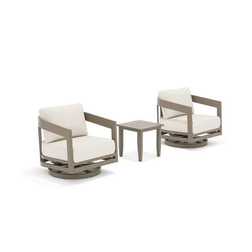 Two swivel chairs with light beige cushions and a matching side table