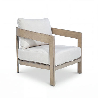 Chair with white cushions and wooden frame on a white background