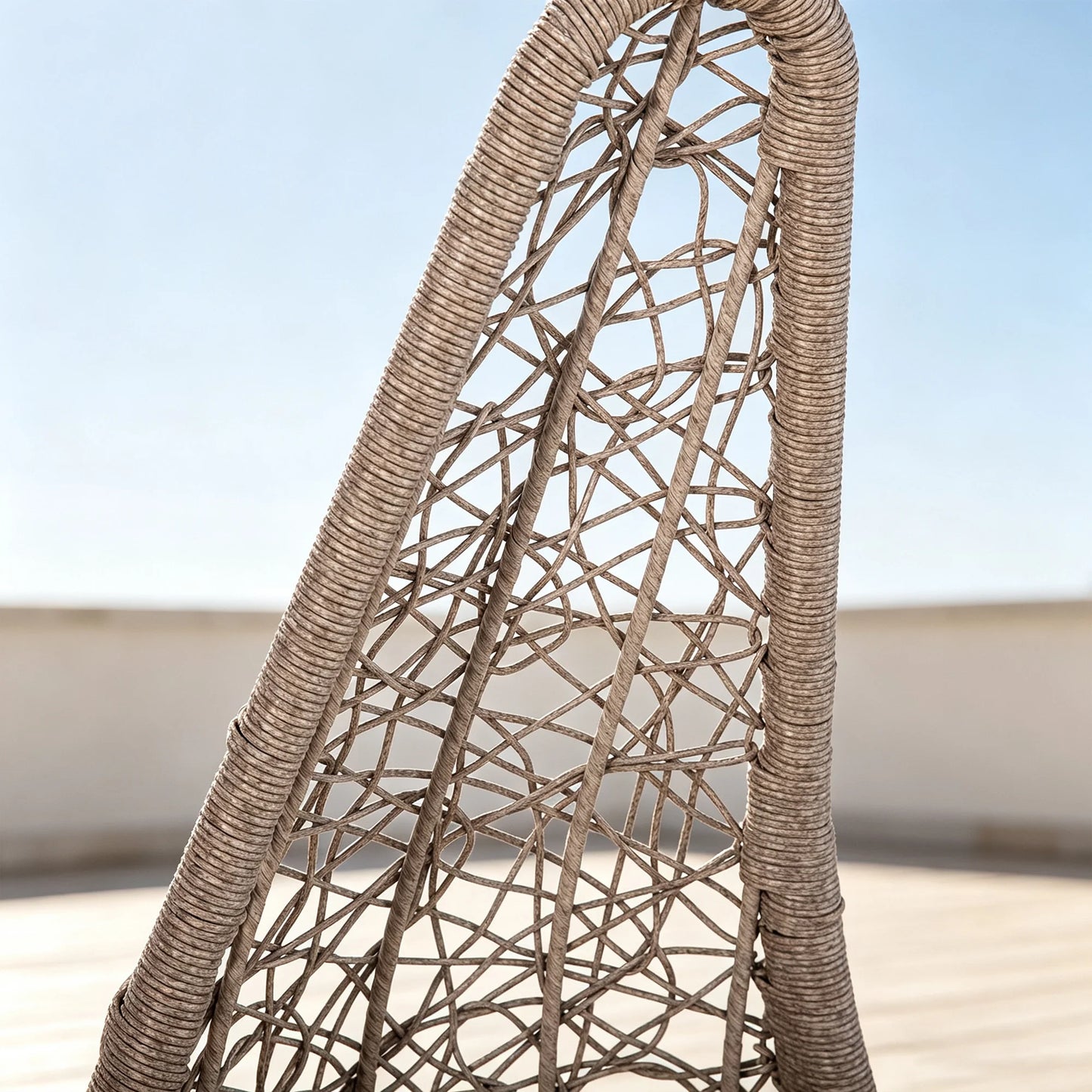 Close-up detail of the durable weather-resistant PE rattan weave texture on Peak Home Furnishings outdoor hanging egg chair.