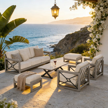 Outdoor patio set with ocean view during sunset