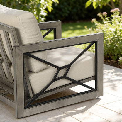 Outdoor chair with beige cushions on a patio