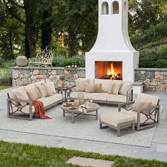 Outdoor patio set with fire pit and seating area in a garden setting