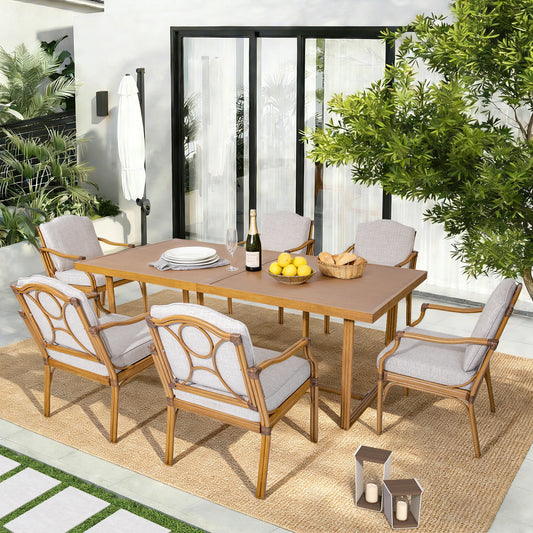 Outdoor dining set with wooden table and chairs in a garden setting.