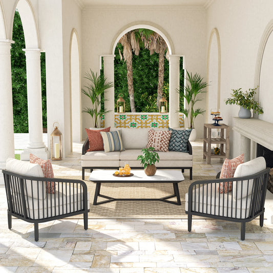 Outdoor patio set with furniture and decor in a sunlit room.