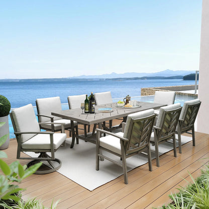 Outdoor dining set with chairs and table on a deck overlooking water
