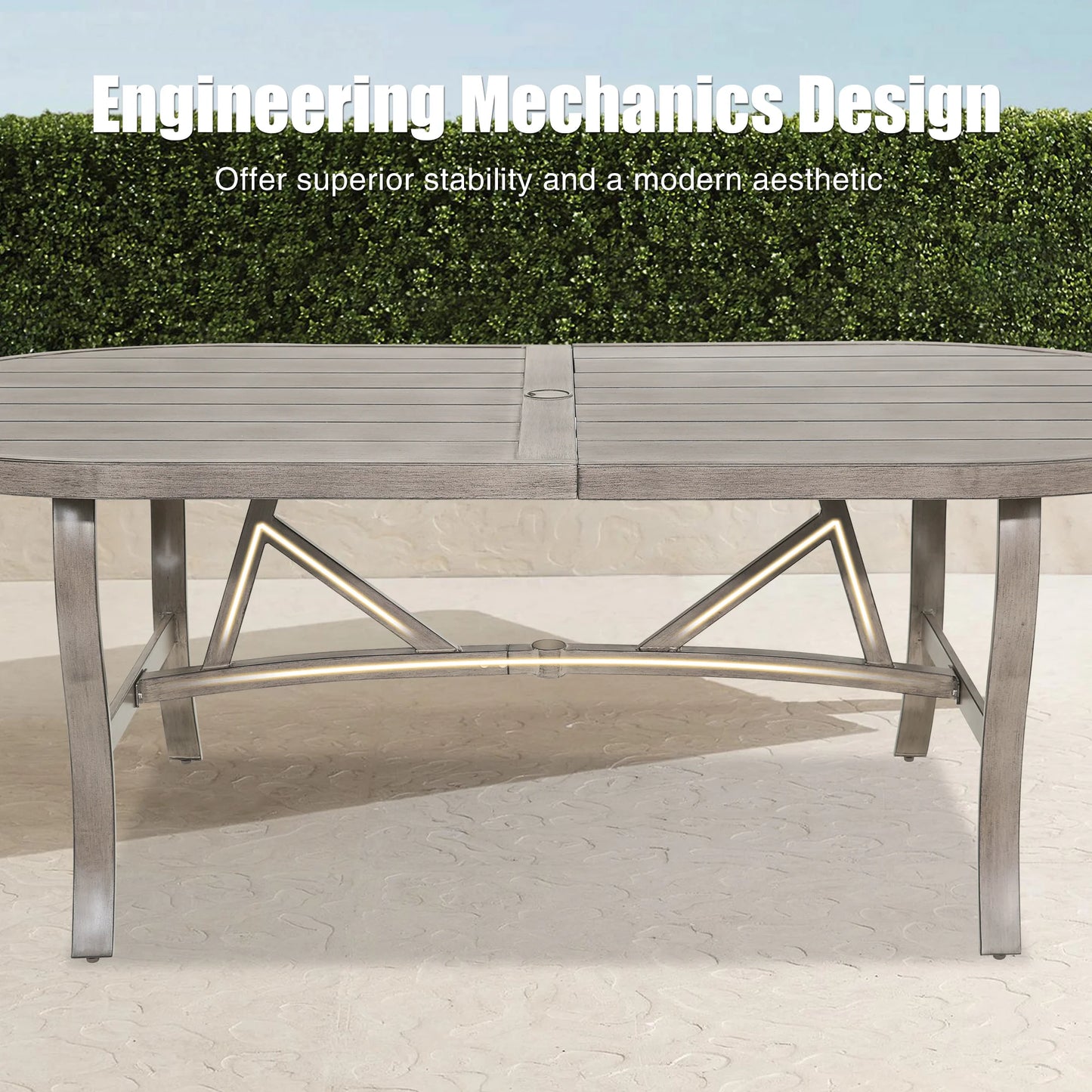Outdoor table with metal frame on a paved surface, text about engineering mechanics design.