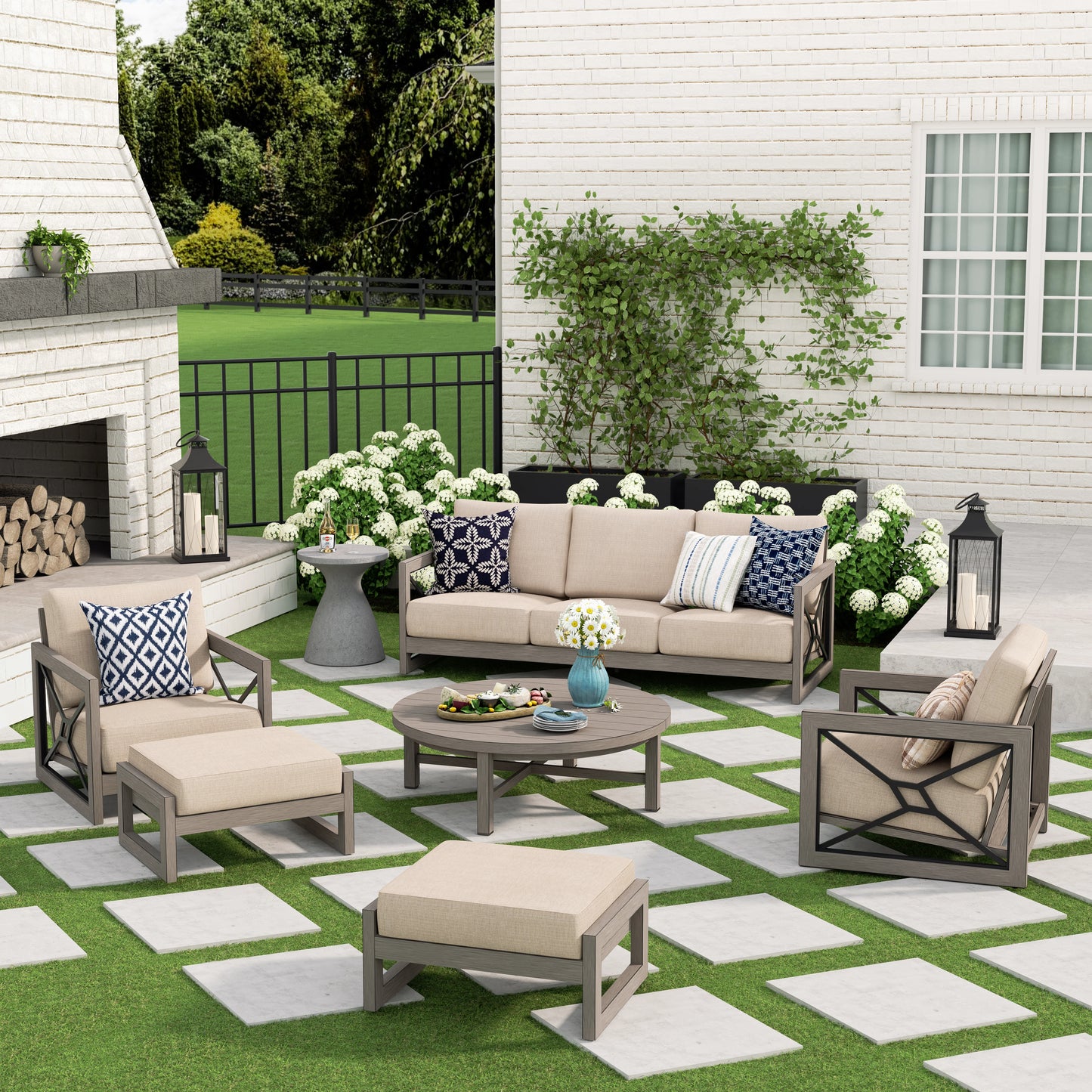 Outdoor patio set with furniture and decor in a garden setting.