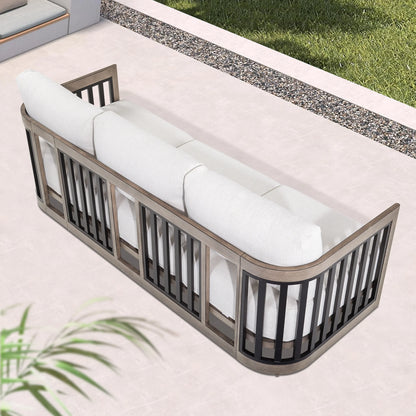 Outdoor bench with white cushions on a patio
