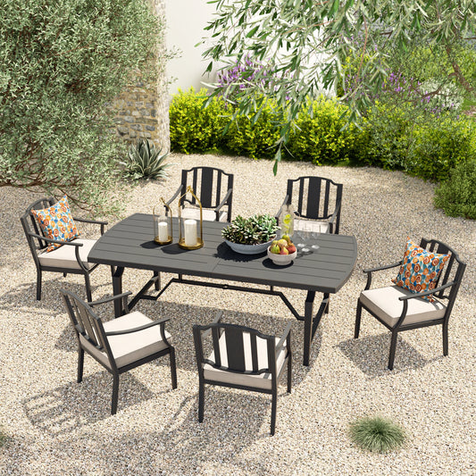 Outdoor patio set with a table and chairs in a garden setting