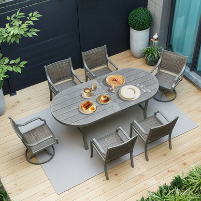 Outdoor dining set with a table and chairs on a wooden deck, surrounded by plants.