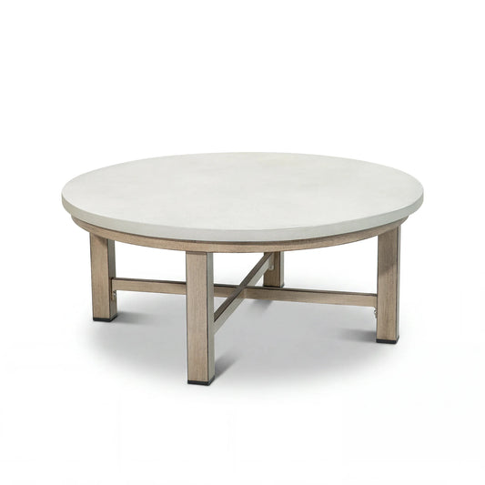 Round coffee table with a white top and wood-look legs on a white background