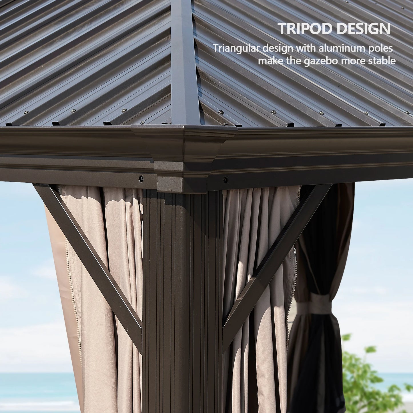 Gazebo with a triangular design and aluminum poles, featuring curtains and a clear sky background.