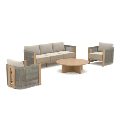 Outdoor furniture set with a sofa, two chairs, and a round table on a white background